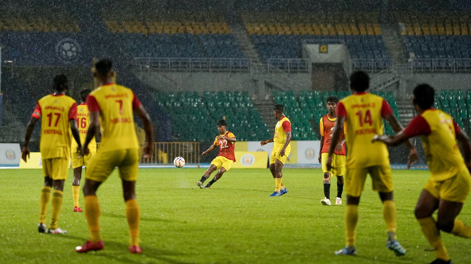 Football match under floodlights