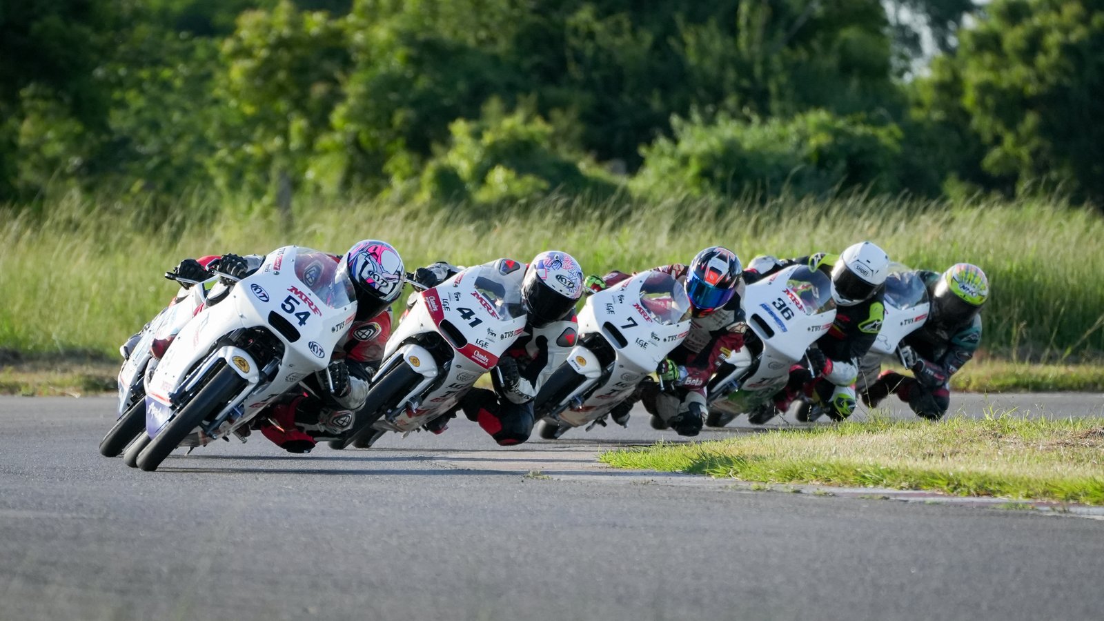 Motorcycle pack cornering in formation