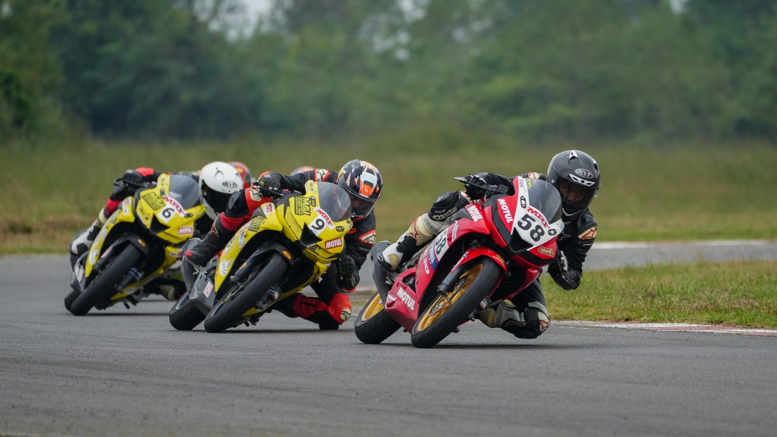 Superbike pack leading through the corner