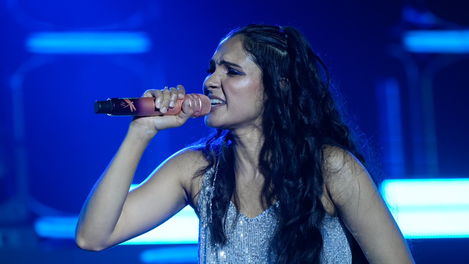 Swetha Mohan mid-performance, close